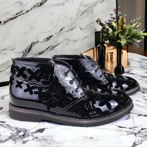 ALAIA black patent leather velvet floral detail lace-up bootie